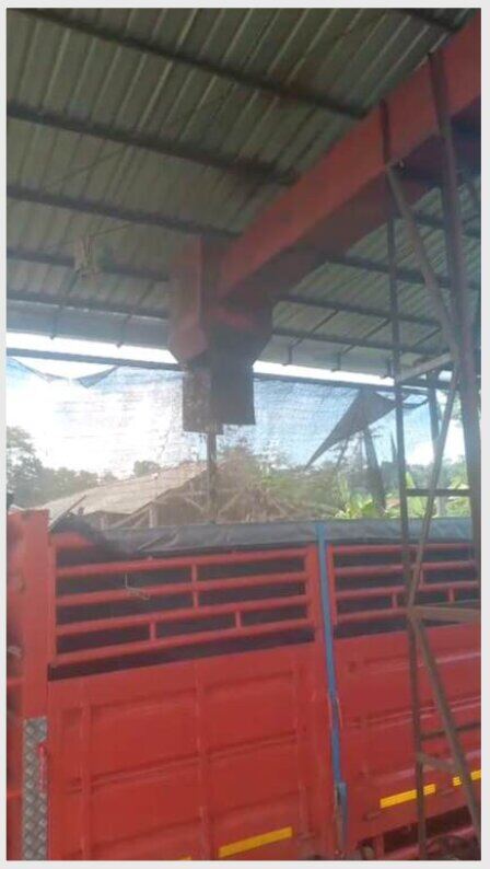 Crane loading operations at processing yard
